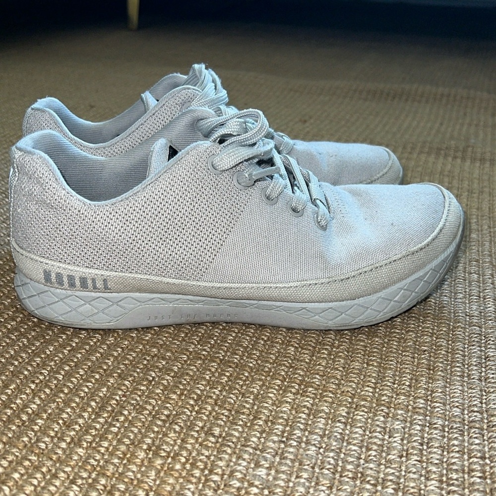 Grey NoBull shoes.